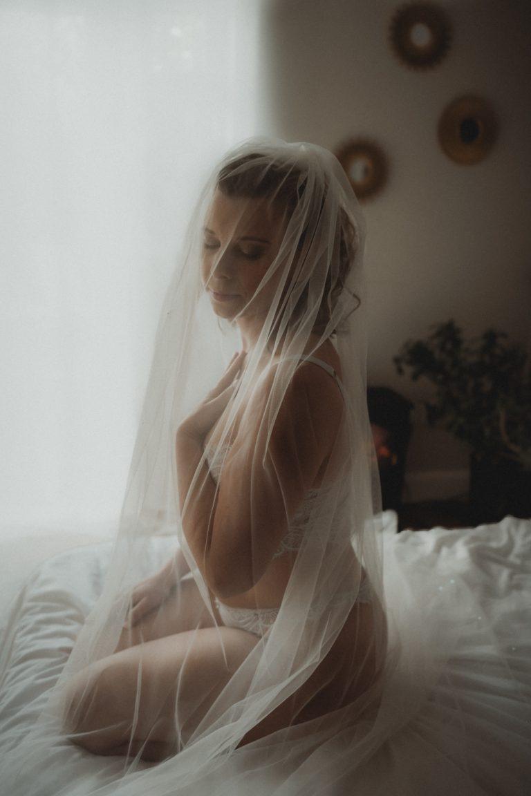 bridal boudoir photoshoot, woman in veil